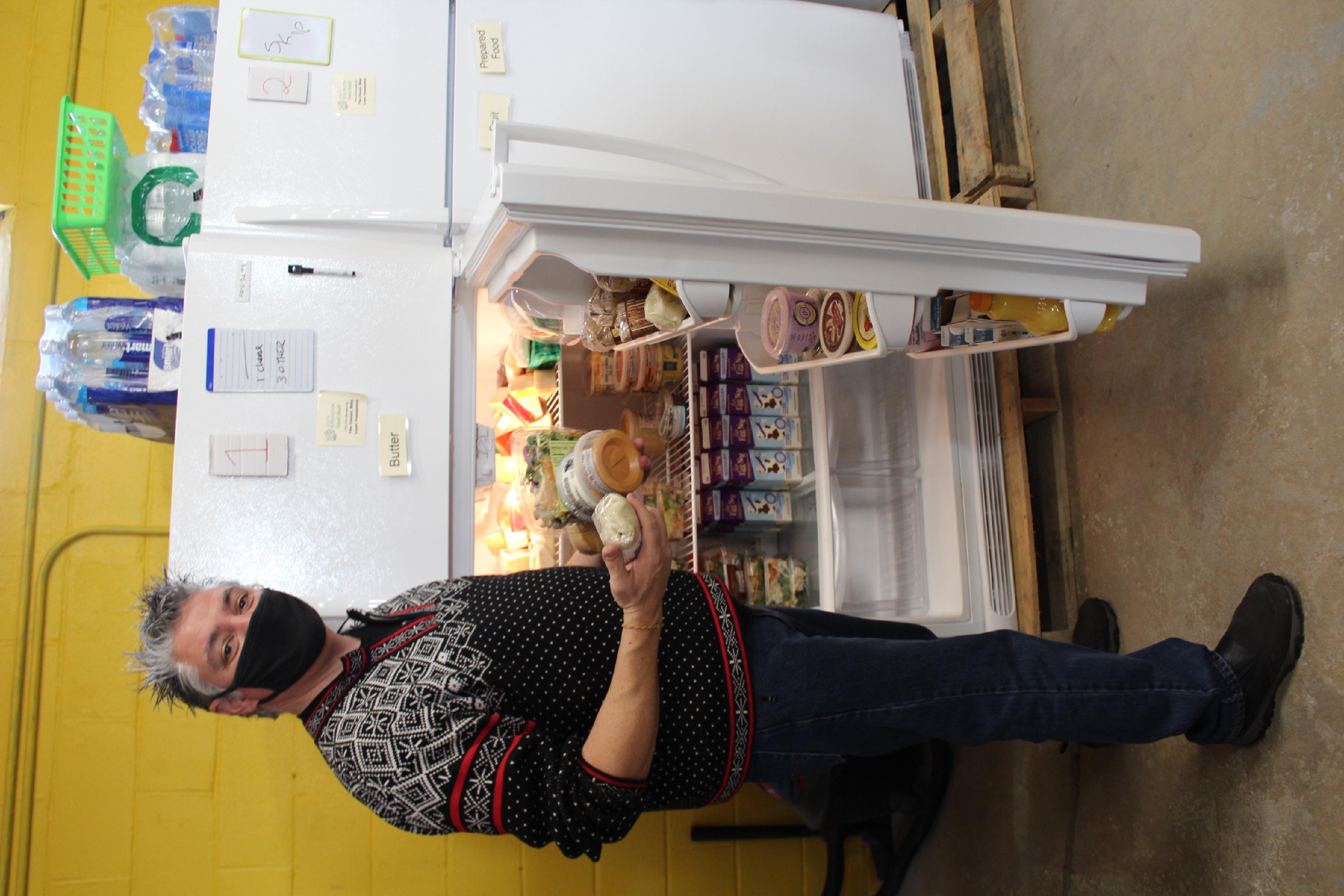 Food Shelf - volunteer at freezer